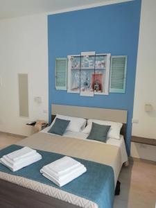 Posteľ alebo postele v izbe v ubytovaní Flamingo Rooms