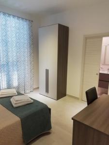 Posteľ alebo postele v izbe v ubytovaní Flamingo Rooms