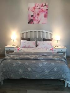 Кровать или кровати в номере Dea Suite