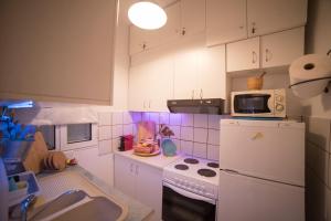 Kuchyň nebo kuchyňský kout v ubytování Dandy Villas Nea Kallikratia Sea View Loft - Open up roof - Down Town