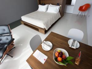 Ένα ή περισσότερα κρεβάτια σε δωμάτιο στο Antonello Colonna Resort & Spa