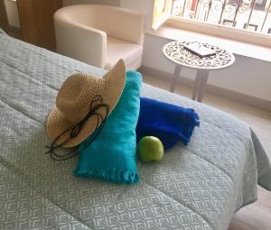 Łóżko lub łóżka w pokoju w obiekcie NATURA SUITE MÁLAGA