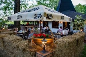 Een restaurant of ander eetgelegenheid bij Aqua Land Villapark