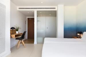 Ein Bett oder Betten in einem Zimmer der Unterkunft HM Tropical