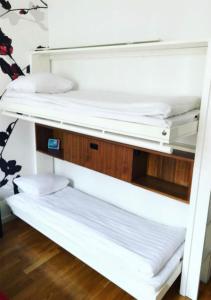 a stack of bunk beds in a room at Quality Hotel Park Södertälje City in Södertälje