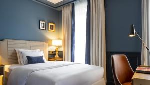 Cama ou camas em um quarto em Hôtel Longemalle