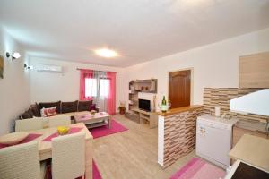 a living room with a couch and a table at Apartment Gara in Kotor