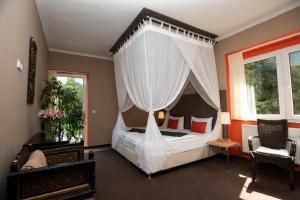Postel nebo postele na pokoji v ubytování Resort Svata Katerina