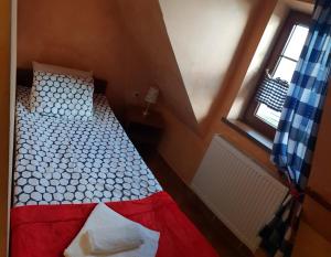 Posteľ alebo postele v izbe v ubytovaní Malinowy Dwór