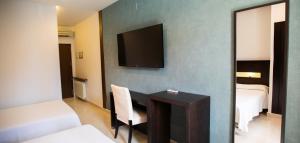 Postel nebo postele na pokoji v ubytování Hotel El Mesón