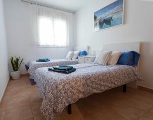 En eller flere senge i et værelse på Mar y tierra