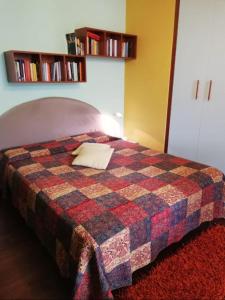 Postel nebo postele na pokoji v ubytování RELAX SANTA CHIARA