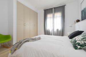 Posteľ alebo postele v izbe v ubytovaní Casa Cosi - Eixample 3