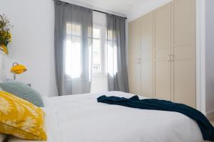 Posteľ alebo postele v izbe v ubytovaní Casa Cosi - Eixample 3