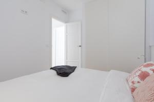 Posteľ alebo postele v izbe v ubytovaní Casa Cosi - Eixample 3
