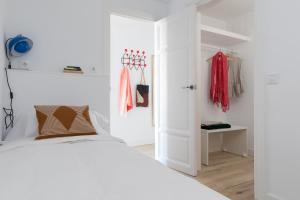 Posteľ alebo postele v izbe v ubytovaní Casa Cosi - Eixample 3