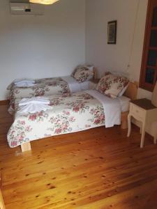 Postel nebo postele na pokoji v ubytování Villa Leonidas just enjoy your holidays