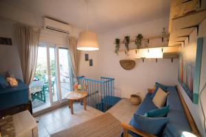 Posezení v ubytování Dandy Villas Nea Kallikratia Sea View Loft - Open up roof - Down Town + 37 fotografií