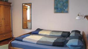 Postel nebo postele na pokoji v ubytování Ferienwohnungen Blätterrausch