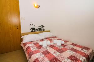 Postel nebo postele na pokoji v ubytování Apartments Magla with Terrace