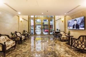 TV a/nebo společenská místnost v ubytování Hotel De La Seine