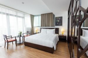 Postel nebo postele na pokoji v ubytování Hotel De La Seine