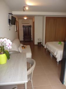 Ένα ή περισσότερα κρεβάτια σε δωμάτιο στο Quinta Lagarça 57