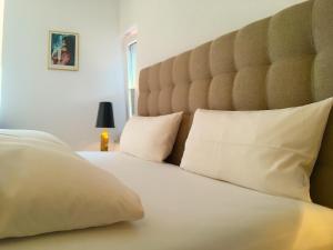Postel nebo postele na pokoji v ubytování Hotel Spiegel Garni