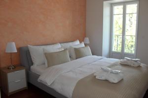 Montreux Grand Rue - Swiss Hotel Apartments客房内的一张或多张床位