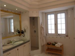 a bathroom with a sink and a shower and a mirror at B&B Villa Di Giorgi in Cefalù +74 photos