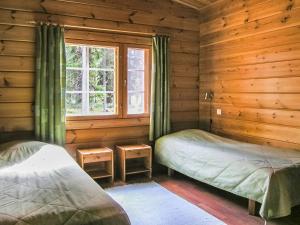 Postel nebo postele na pokoji v ubytování Holiday Home Yläneuvola silta by Interhome