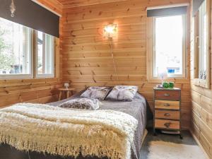 Postel nebo postele na pokoji v ubytování Holiday Home Homma by Interhome