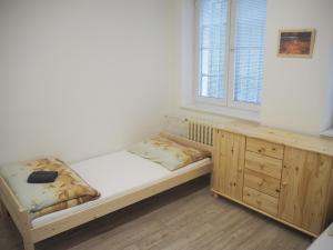 Postel nebo postele na pokoji v ubytování Economy Apartments České Švýcarsko