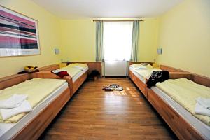 Posteľ alebo postele v izbe v ubytovaní Austrian Sports Resort, BSFZ Obertraun