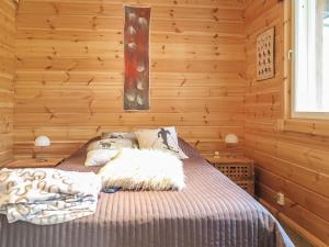 Postel nebo postele na pokoji v ubytování Holiday Home Homma by Interhome