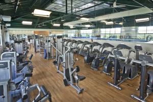 a large gym with rows of cardio machines at Bourbon Residence Barra da Tijuca - Rio de Janeiro in Rio de Janeiro