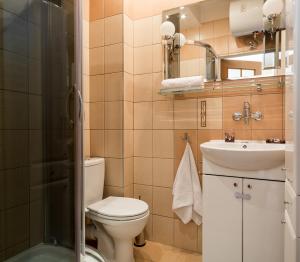 Kúpeľňa v ubytovaní ZAKOHOME- Apartamenty Kościelisko Centrum