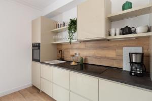 Kuchyň nebo kuchyňský kout v ubytování Casa Cosi - Eixample 4 + 25 fotografií