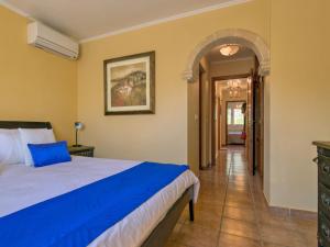 A bed or beds in a room at Villa Villa Meena by Interhome
