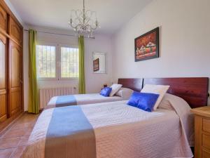 A bed or beds in a room at Villa Villa Meena by Interhome