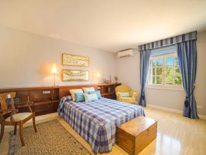 Postel nebo postele na pokoji v ubytování Villa Villa Can Mandol by Interhome