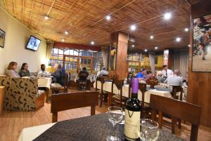 A restaurant or other place to eat at Hotel Prisma Cusco