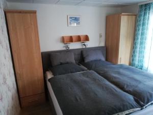 Katil atau katil-katil dalam bilik di FeWo Inselzeit