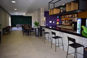 Ο χώρος του lounge ή του μπαρ στο Prive Ilhas do Lago - OFICIAL
