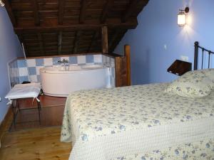 Cama o camas de una habitación en Posada La Villanita