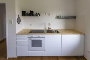 Kuhinja oz. manjša kuhinja v nastanitvi Flataid Apartmenthaus Brauhausstrasse