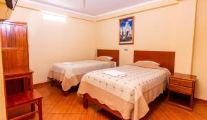 Cama o camas de una habitación en Hotel Tamia