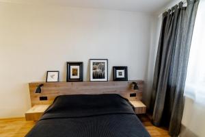 Tempat tidur dalam kamar di OpenApart - Скандинавия #2