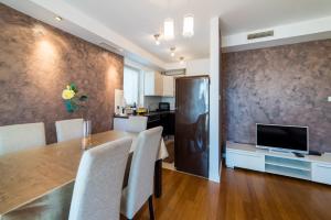 TV a/nebo společenská místnost v ubytování Dubrovnik Style Luxury Apartment