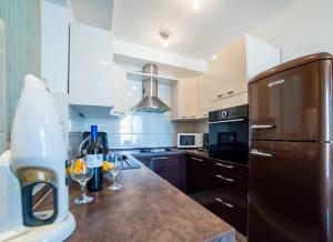 Kuchyň nebo kuchyňský kout v ubytování Dubrovnik Style Luxury Apartment